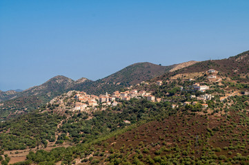 A small village Sant'Antonino in the hills above the sea on the island of Corsica