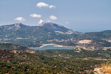 Mountainous landscape with lake in the middle of the island of Corsica