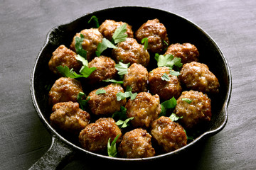 Meatballs in frying pan