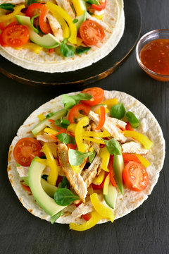Tacos with chicken meat and vegetables