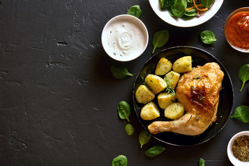 Roasted chicken leg with baked potato