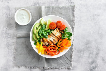 Vegetable salad with roasted chicken breast