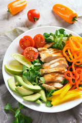 Vegetable salad with roasted chicken breasy