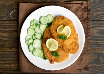 Schnitzel with cucumber salad