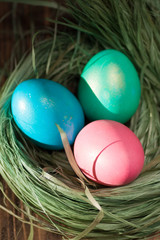 Colorful easter eggs in basket a