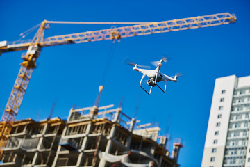 drone survellance over construction area. building site inspection.