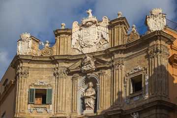 Fototapeta na wymiar Facade of one of the corner buildings of Quattro Canti or Piazza Vigliena