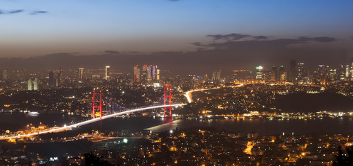 Bosphorus Bridge in Istanbul from camlica hill at night sunset