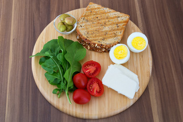 Breakfast concept. Egg, toast, olive and tomatoes on the plate. Tea concept.breakfast at the weekend. Sunday breakfast. healthy food