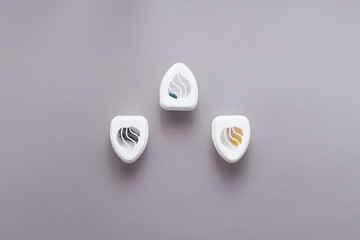 Air freshener on grey background , top view, flat lay