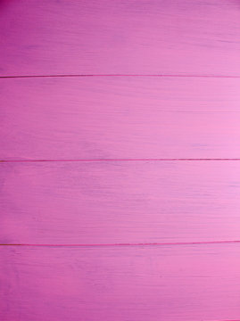 Pink painted wood board background texture