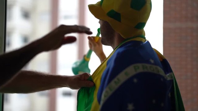 Father and Son Celebrating Brazil Victory