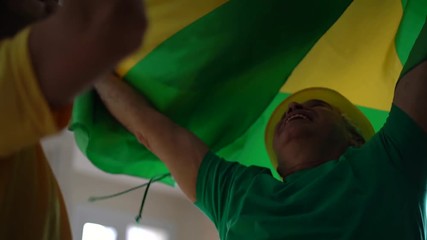 Father and Son Celebrating Brazil Victory - Powered by Adobe
