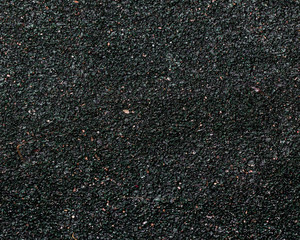 Soft rubber coating in black with green specks