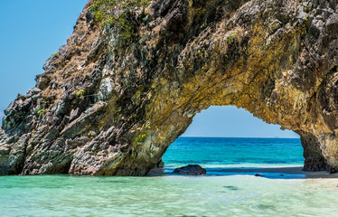Fototapeta premium tunnel stone on Khai Island. Satun, Thailand.