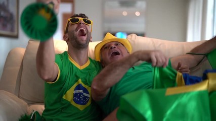 Father and Son Celebrating Brazil Victory - Powered by Adobe