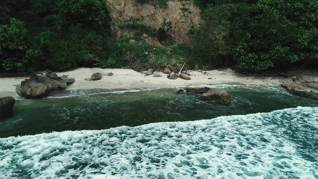 Aerial sideway footage of NAMPU beach, South Yogyakarta, Indonesia - March, 2018