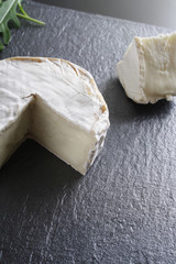 cheese brie stone background black dark