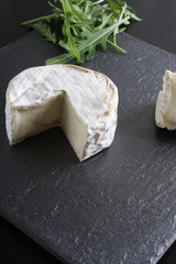 cheese brie stone background black dark