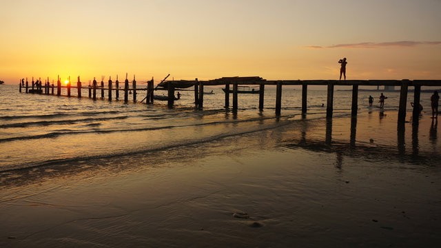 wooden jetty in the sunset © chriss73