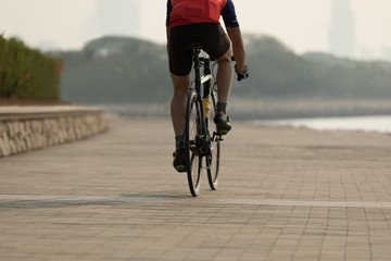 cyclist riding  bike on seaside