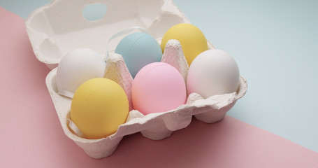 Colorful egg in paper packaging, for Easter holiday