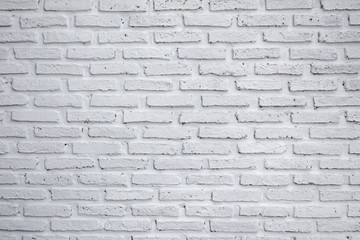 Bricks wall painted with white color in modern style background.