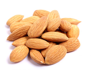 Almonds isolated. Group of almond nuts isolated on white background. Full depth of field