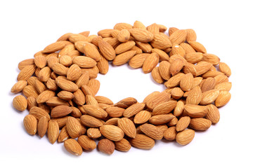 Almonds isolated. Group of almond nuts isolated on white background. Full depth of field