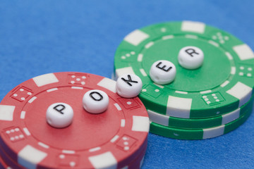 word "poker" with poker chips , gambling concept