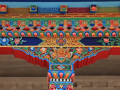 Detail of a colorful painted column of a monastry in Nepal. Shyaphru Besi, Langtang National Park.
