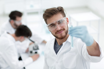 closeup. scientist with beaker