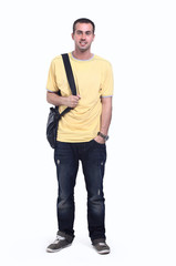 Fototapeta premium Slylish fashion man traveling with a bag