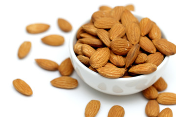 Almonds isolated. Group of almond nuts isolated on white background. Full depth of field