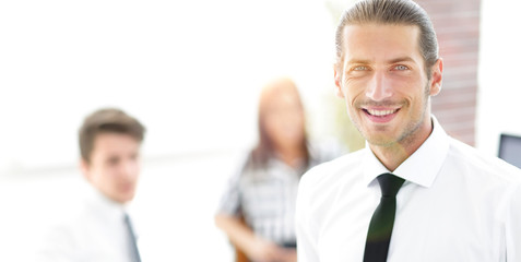 successful young business men on blurred background