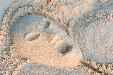 Face of alien scream build of sand