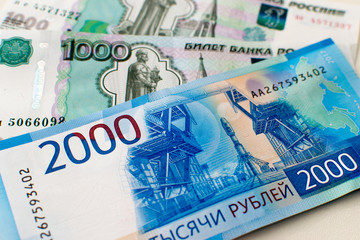 New 2000 and 1000 rubles close-up. Background.