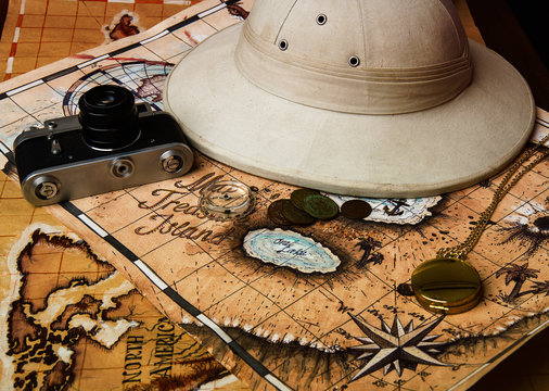 pith helmet and maps