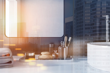 Black round bathroom sink close up toned