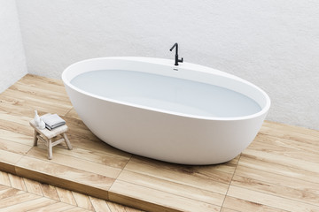 White tub in a white bathroom, top view