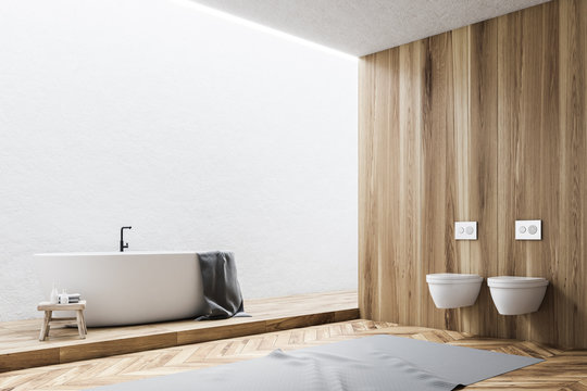 White and wooden bathroom corner
