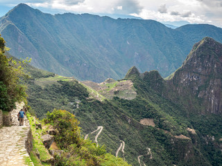 Naklejka na ściany i meble Aerial view of Machu Picchu from Sun Gate in Inca trail - Peru