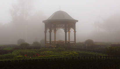 Chinese gazebo hidden in the fog