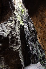 Dark grey granite stone wall.