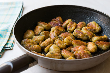 Fried Crispy Mussels Cooked in Pan.