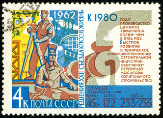 Ukraine - circa 2018: A postage stamp printed in USSR show propaganda poster Building and statistics. Forecast until 1980. Series: Resolution of 22nd Communist Party Congress. Circa 1962.