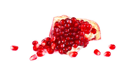 Juicy pomegranate. Fresh seeds of pomegranate isolated on white background. Macro