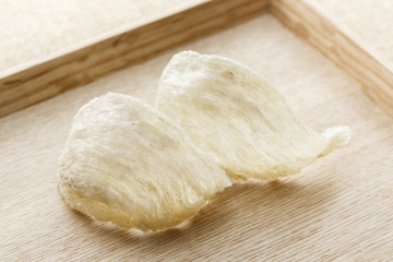 two bird's nest on the wooden tray, close-up
