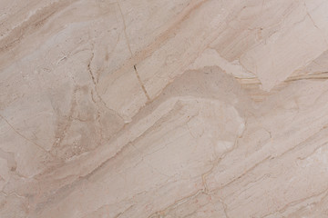 Marble background in gentle light brown tone.