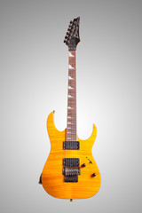 Fototapeta premium The image of a yellow electric guitar